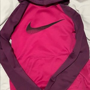 Purple and hot pink Nike hoodie.